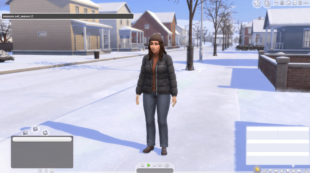 The cheat bar open over a snowy suburban street with seasons.set_season 2 typed into it